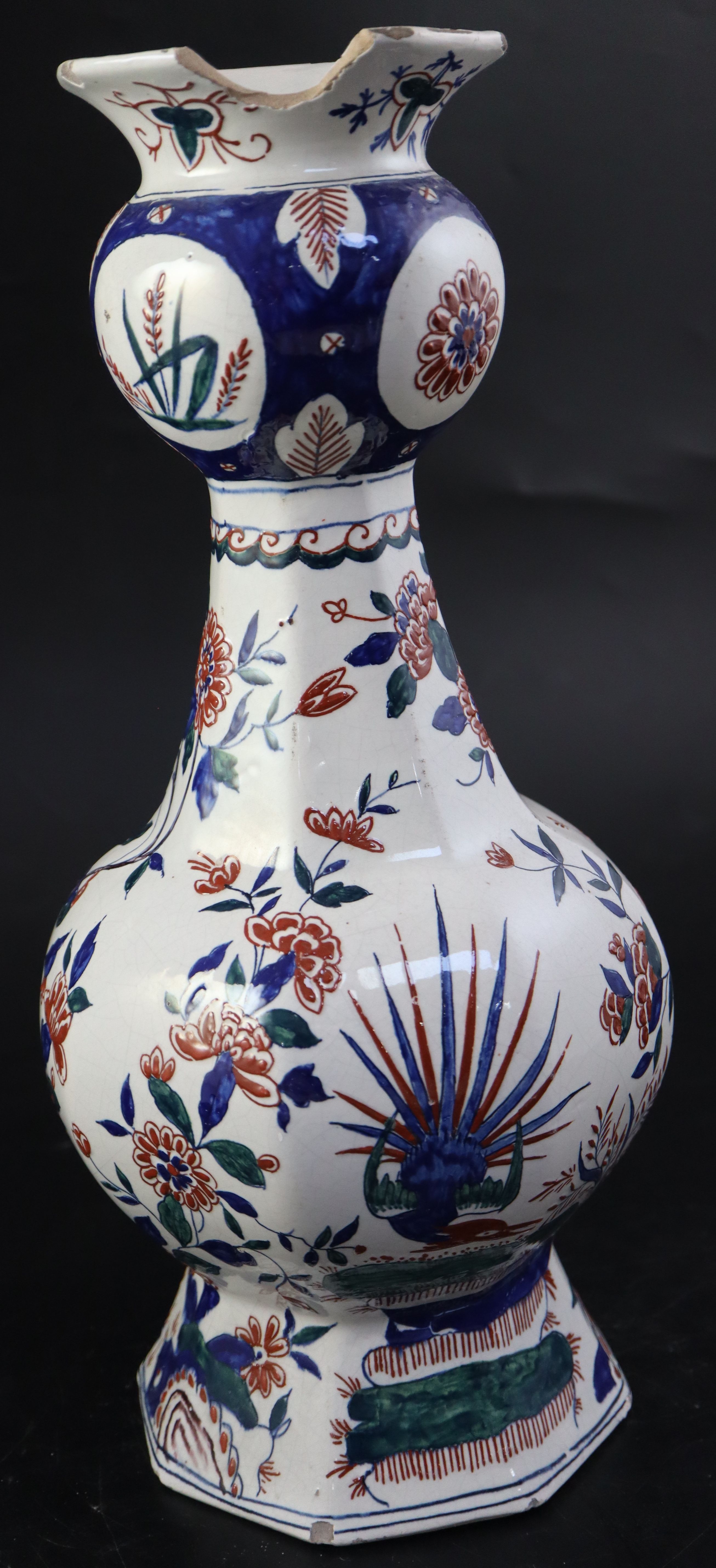 A 19th century faience octagonal vase, height 36cm (a.f.)